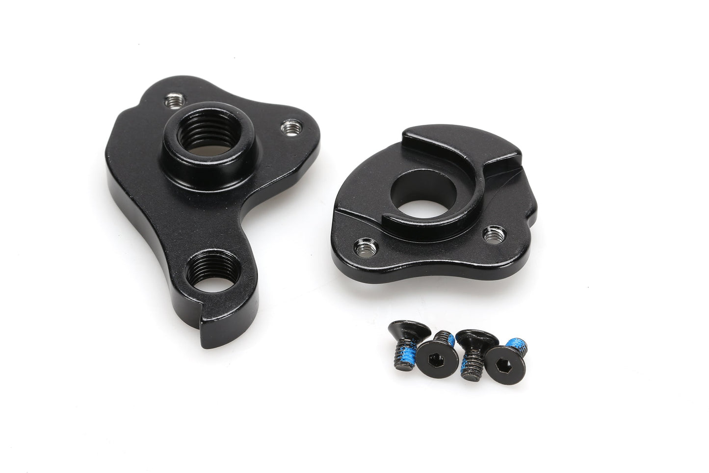 Close-up of the Masi Bikes HANGER MASI VINCERE, a black metal bicycle dropout hanger for rear derailleur adjustment. Includes two main pieces with threaded holes and four small screws featuring blue thread lock, all on a white background.