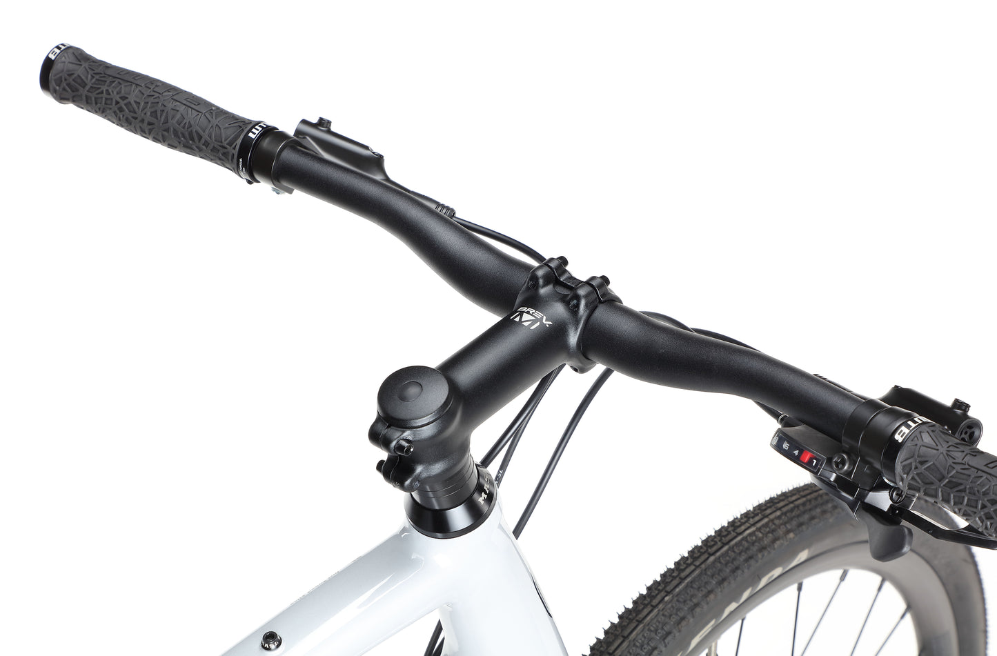 Close-up of BRUNELLO 3s black handlebars and brake levers, with a white frame and textured grips, against a plain white background.