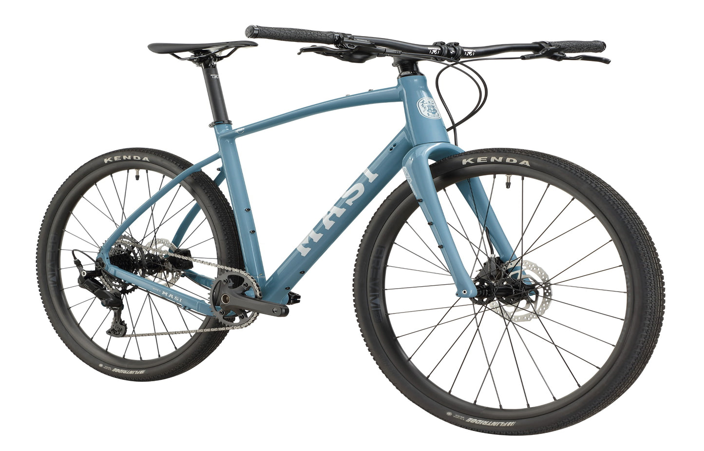 BRUNELLO 3 blue gravel bike with drop handlebars, disc brakes, and Kenda tires, front-side view on a white background.