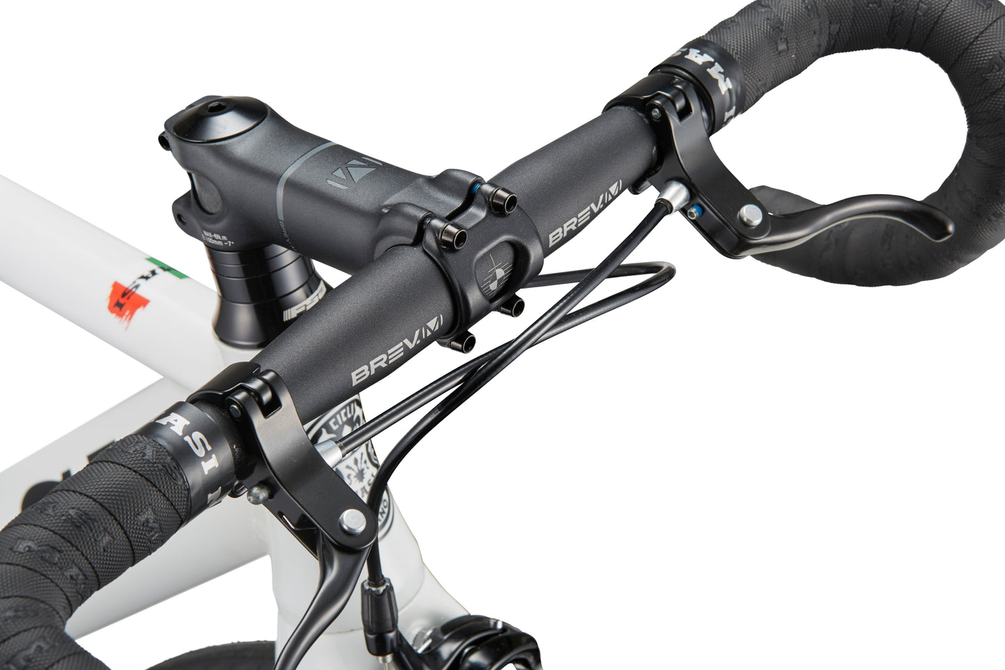 Close-up of black handlebars and brake levers on the Coltello Geometry, a white single-speed fixie with minimalist design, viewed from above.