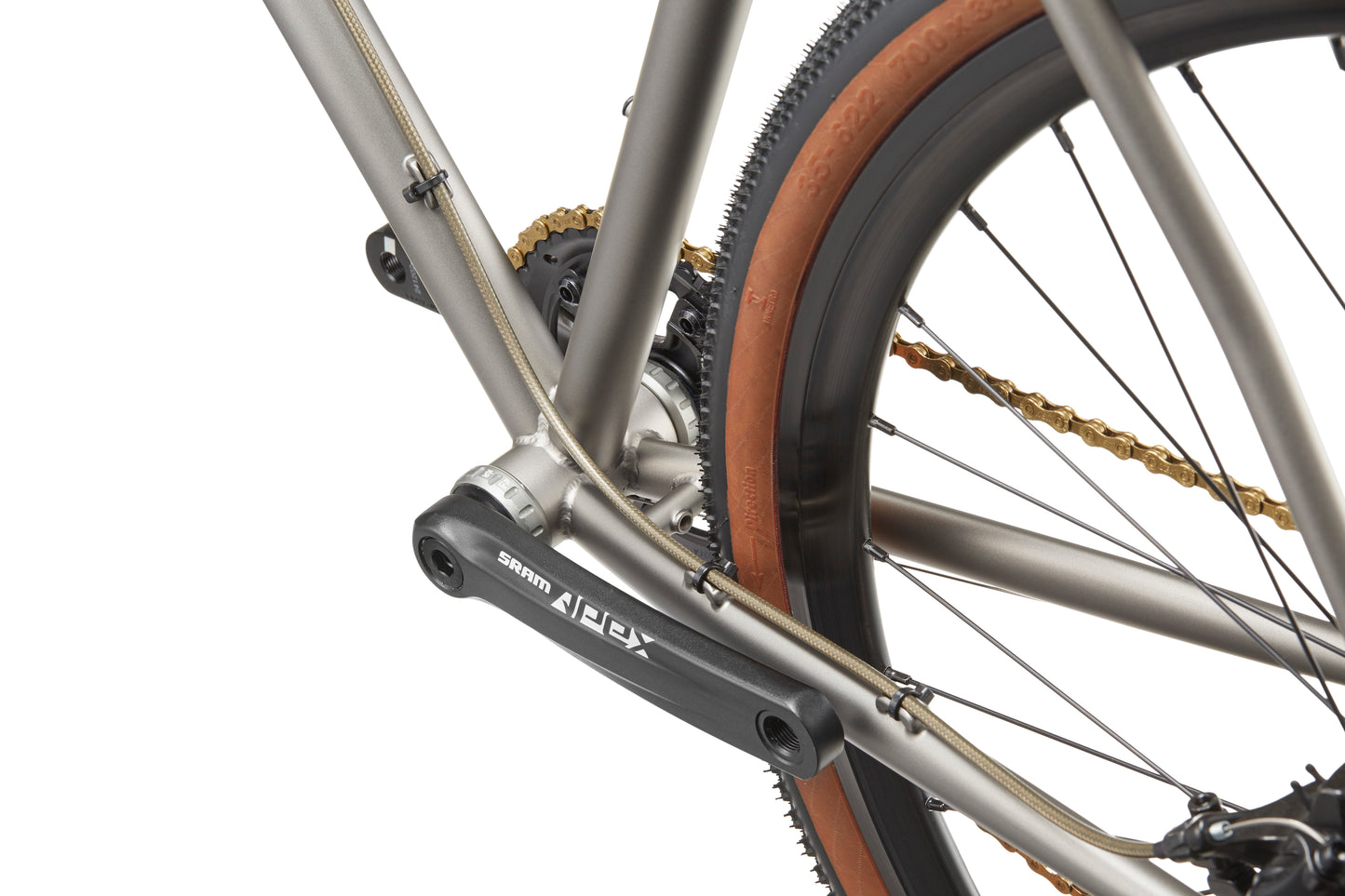 Close-up of the CATALINA 1’s rear wheel and SRAM Apex crank arm, highlighting Catalina style and a tan sidewall tire.
