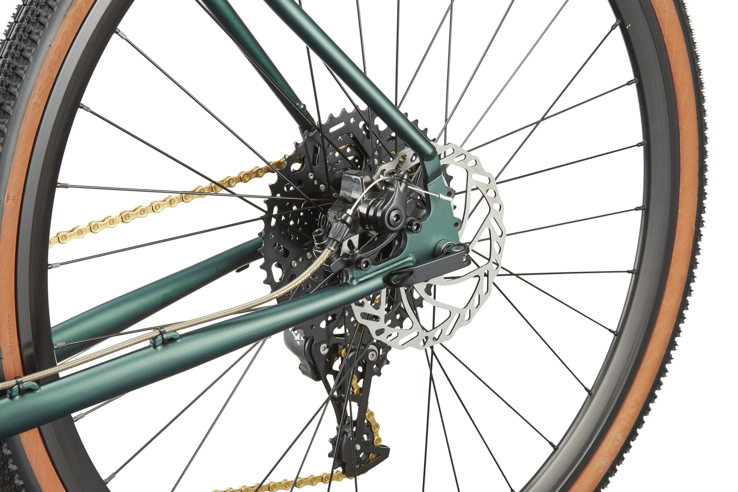 Close-up of the CATALINA 1 bicycle’s rear wheel, highlighting gears, chain, disc brake rotor, and derailleur on a white background.