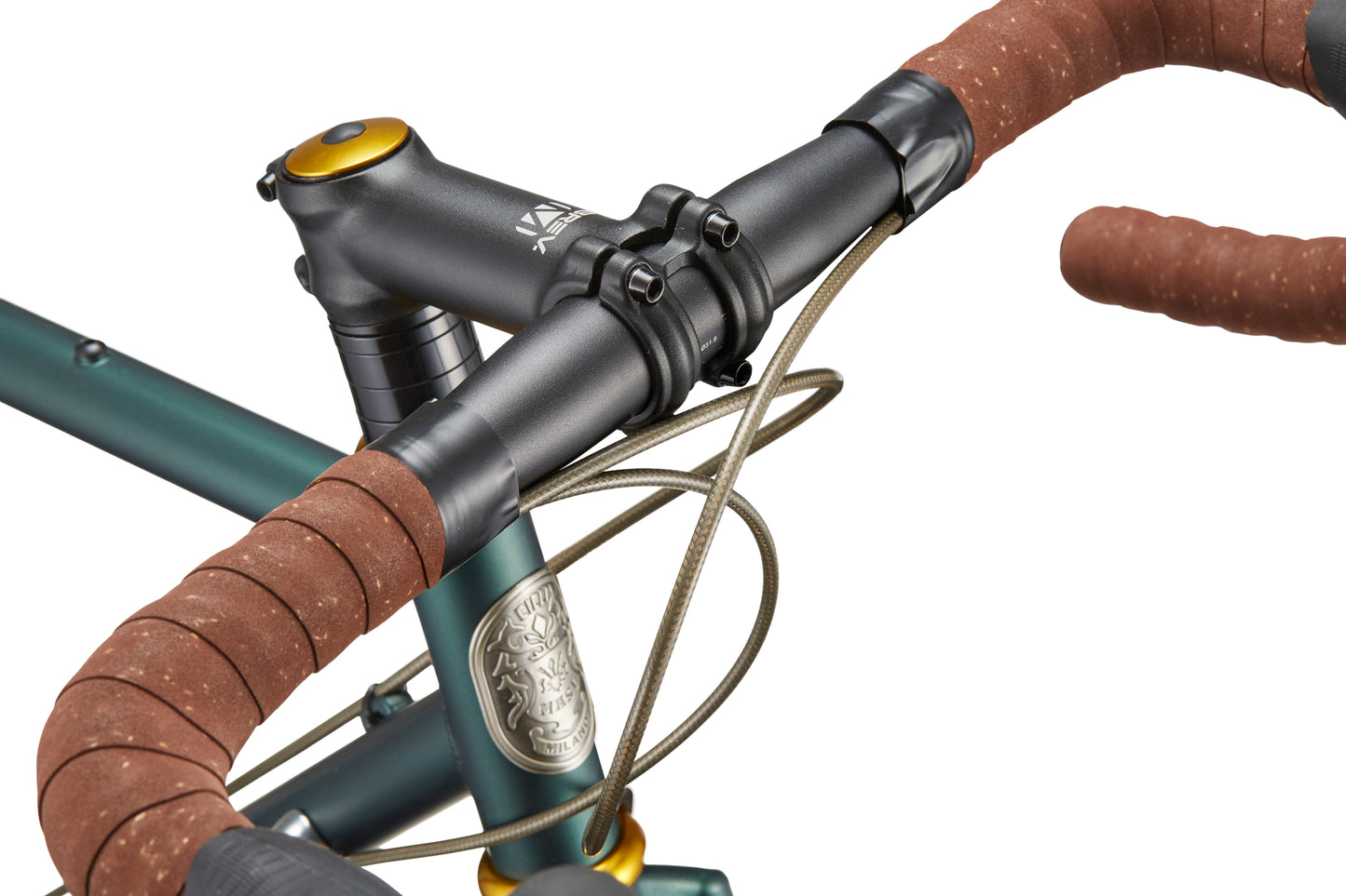 Close-up of CATALINA 1 handlebars wrapped in brown tape, with brake cables and head badge on a green chromoly steel frame.