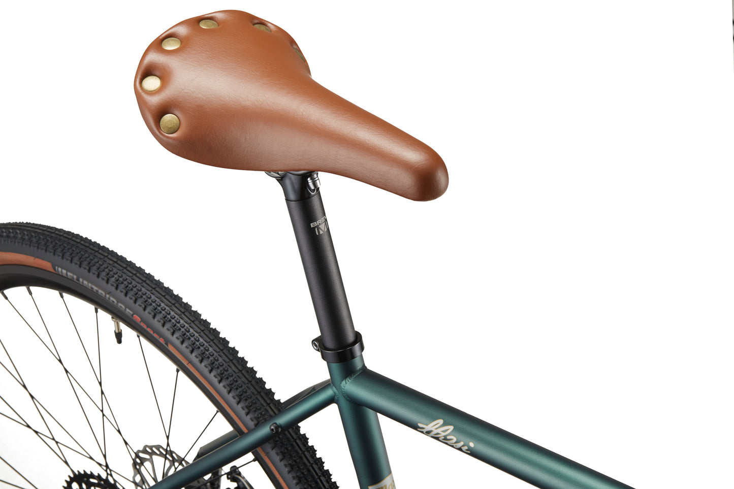 Close-up of CATALINA 1’s brown leather seat with metal rivets on a green chromoly steel frame and black seat post.