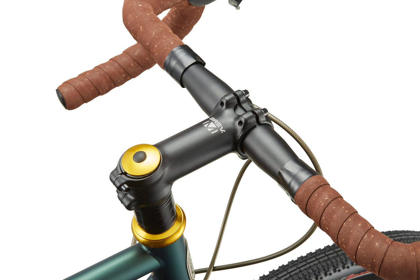 Close-up of CATALINA 1 handlebars with brown tape, black stem, and gold cap, showcasing classic Italian cycling style.