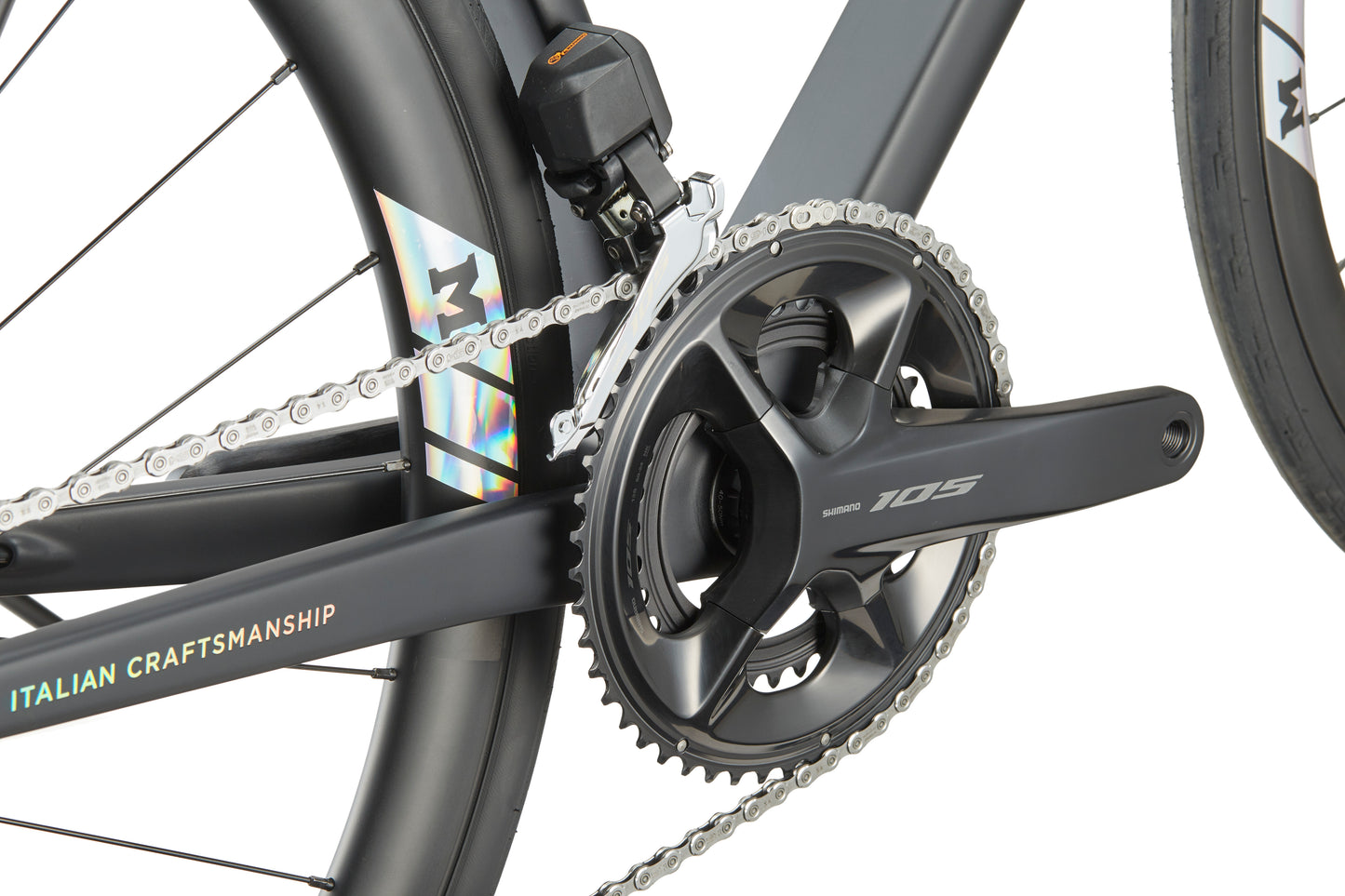 Close-up of a Shimano 105 crankset and chain on a GRAN CORSA carbon road bike, Italian Craftsmanship text in view.