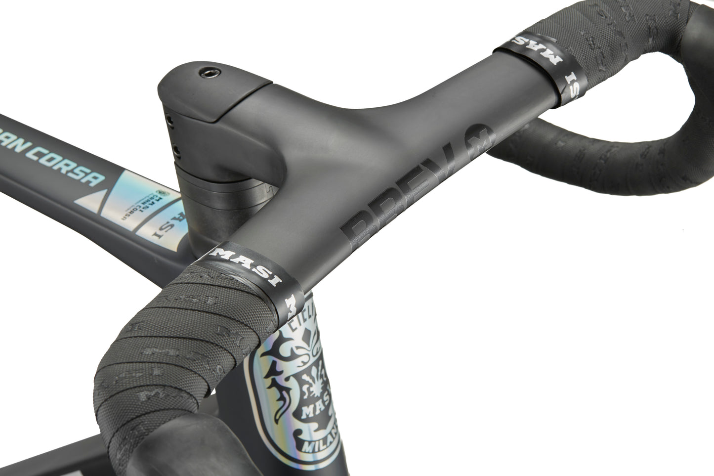 Close-up of the GRAN CORSA matte black carbon handlebar and stem, featuring Masi logo and textured bar tape.
