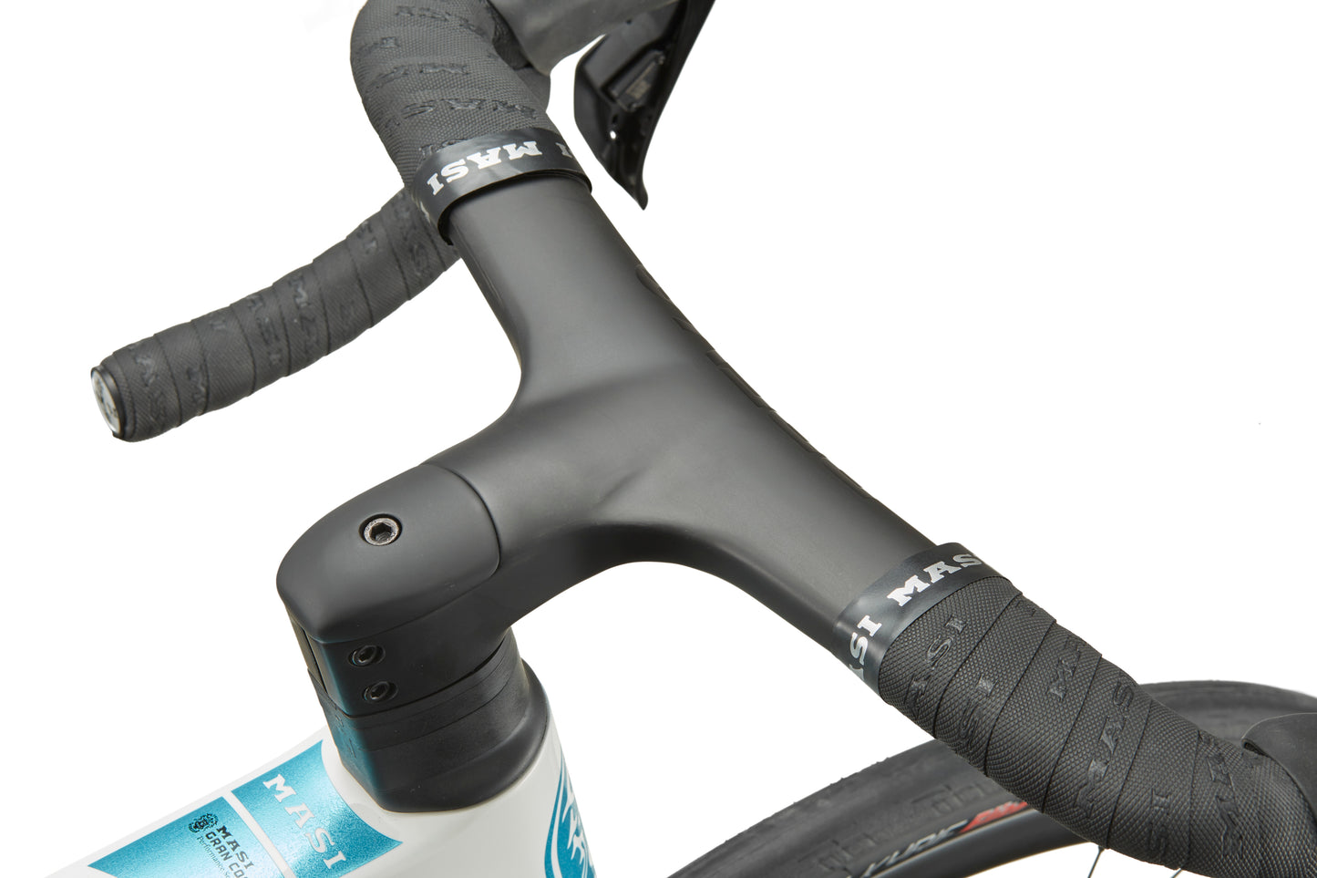 Close-up of black handlebars and stem with wrapped grips on a white GRAN CORSA carbon road bike frame and front wheel.