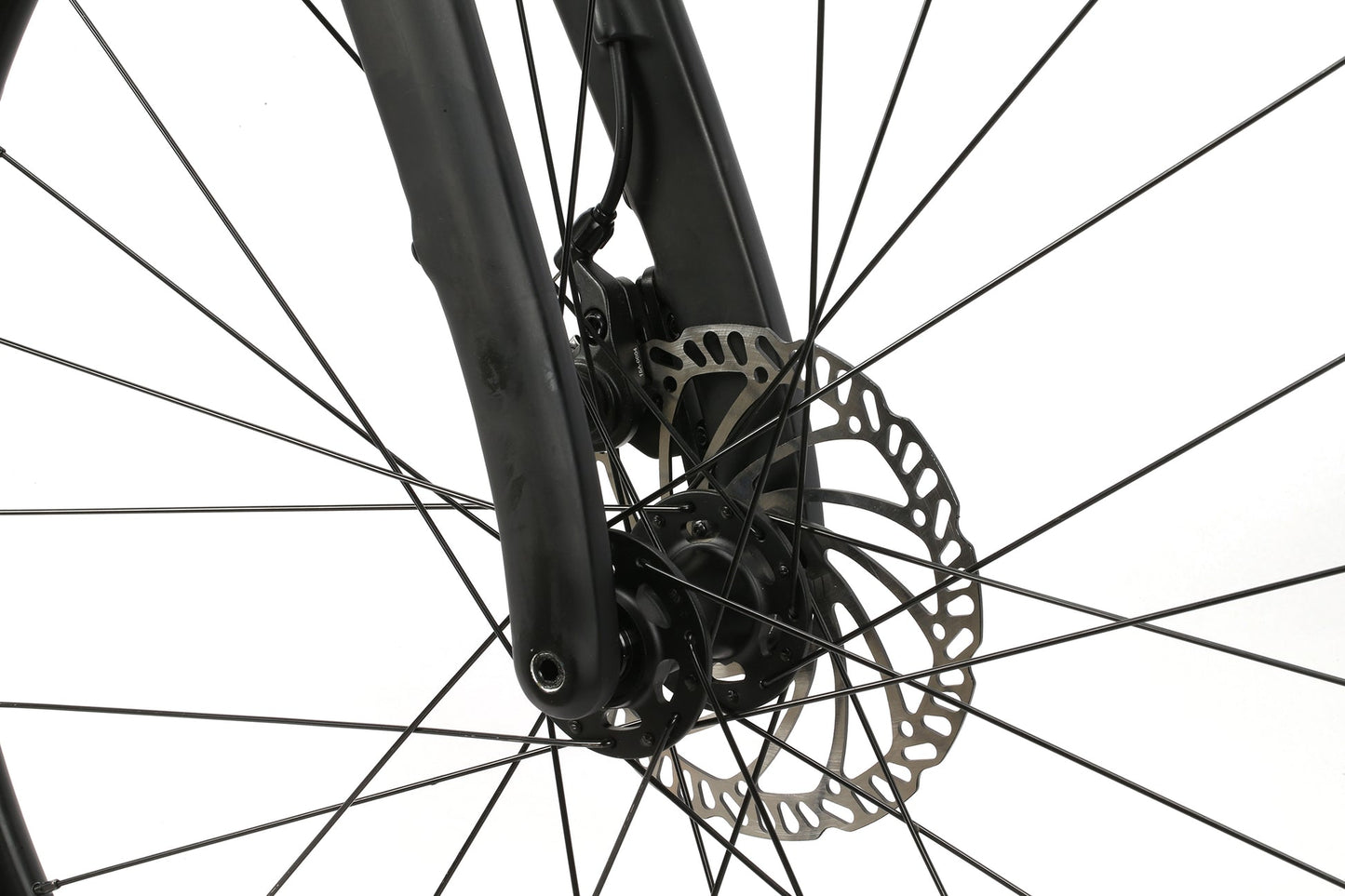 Close-up of BRUNELLO ADX wheel with carbon fork, disc brake rotor, and spokes against a plain background.