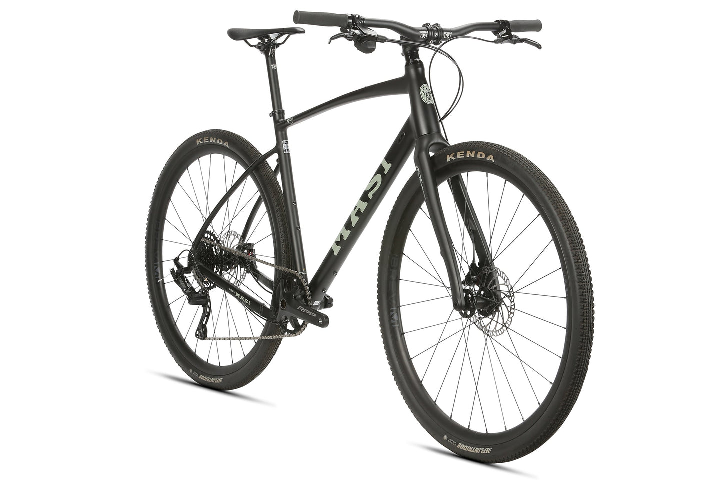 The BRUNELLO FB NOVE is a sleek black hybrid bicycle with knobby tires, an aluminum gravel frame, and flat handlebars, seen from the front.