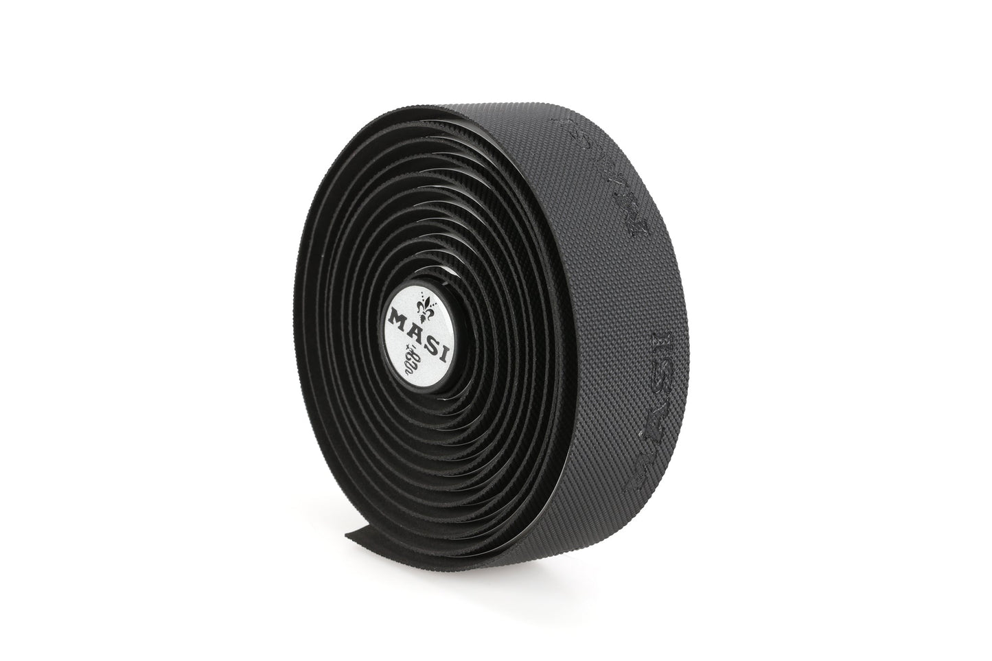 A roll of tightly coiled, textured black Masi Bikes GRIPPER TAPE stands upright against a white background, featuring a white inner cap with the brand name Masi.