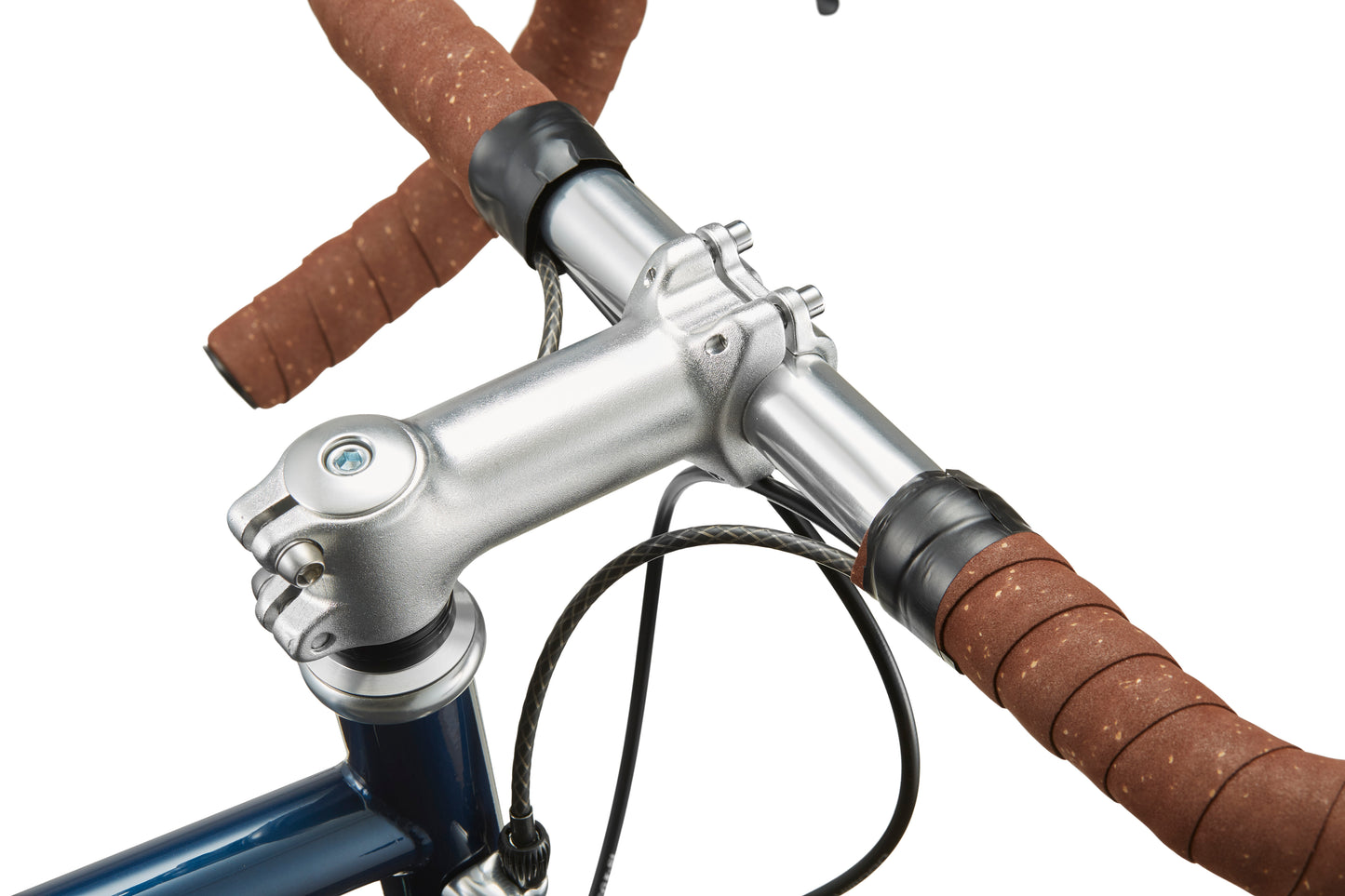 Close-up of the STELVIO 1 MiniVelo handlebar with brown grips, silver stem, and brake cables—perfect for stylish urban riding.