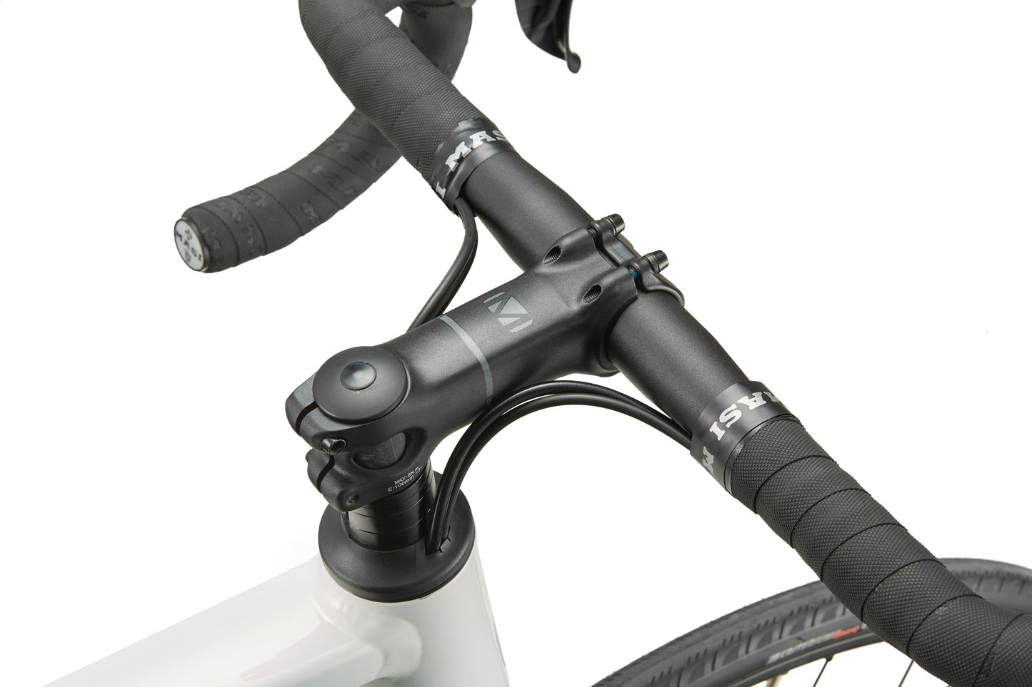 Close-up of the VINCERE 3s handlebar and stem with black grips, an adjustable stem, and a glimpse of its white alloy frame.