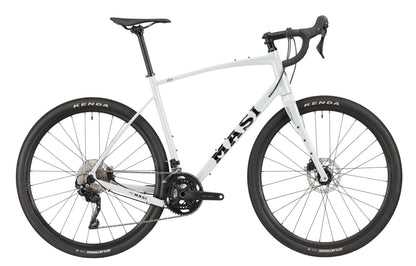 The BRUNELLO 1 road bike includes black handlebars, a silver frame with MASI logo, and disc brakes.