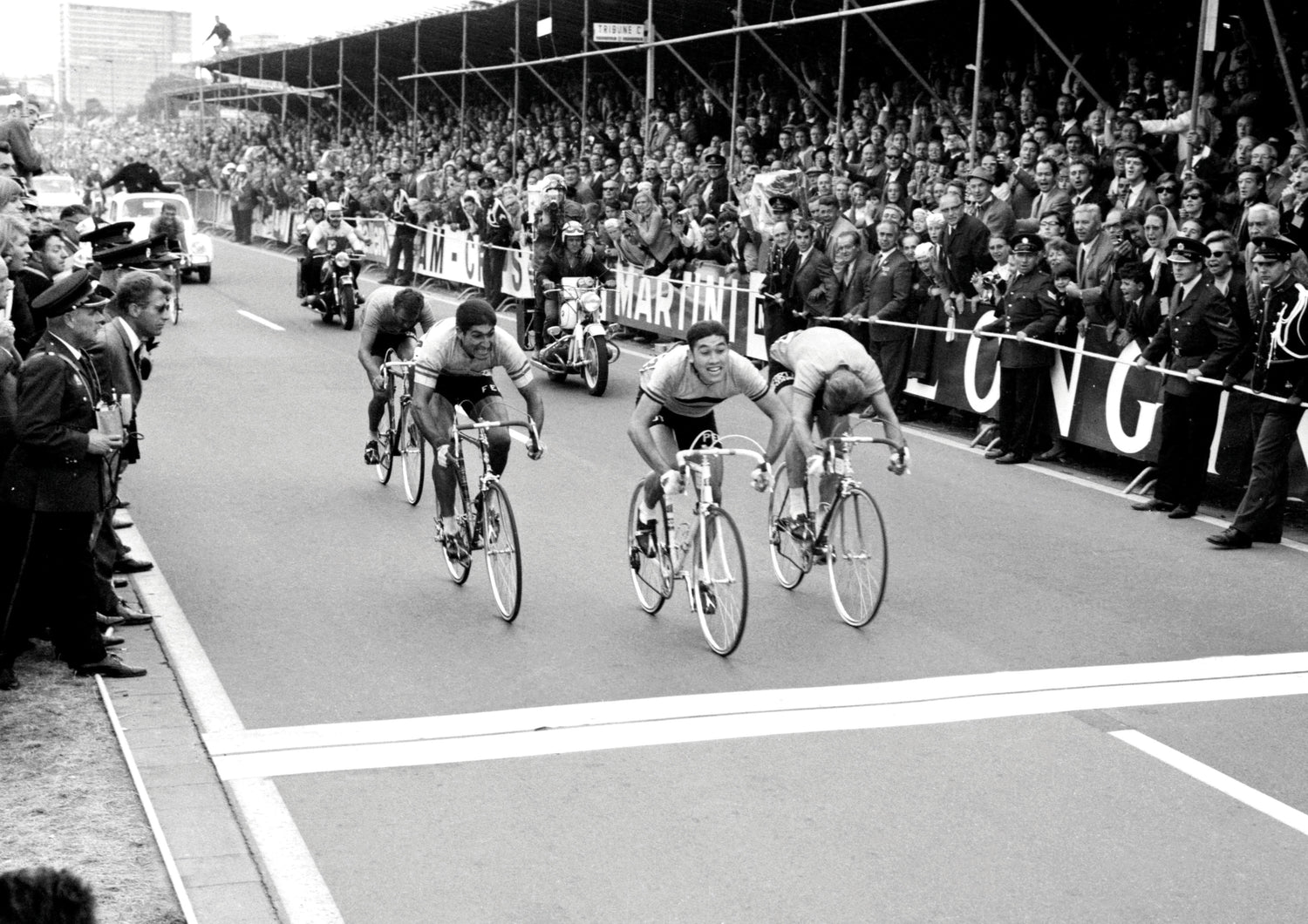 Group of bicycle riders near the finish line