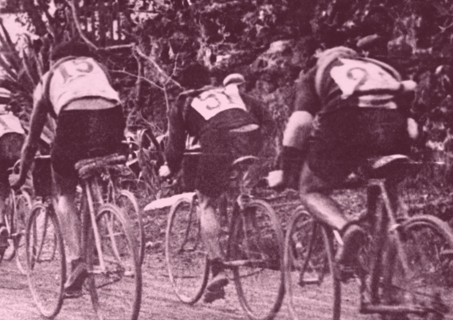Three riders on a dirt road through wooded terrain, early 1900s, the original gravel was just the road